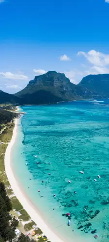 1080x2400 Mobile 自然风景 Wallpaper - 航拍白沙滩海湾 澄澈碧海停泊游船 远处青山环抱
