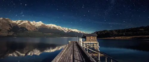 3840x1600 Ultrawide Wallpaper - 星空下的湖边木桥雪山超宽屏壁纸