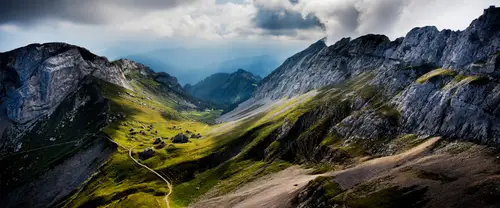 3840x1600 Ultrawide 自然风景 Wallpaper - Winding Path Through an Alpine Valley Under Dark Clouds