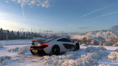 3840x2160 Desktop 汽车超跑 Wallpaper - 雪原风车下的极速超跑